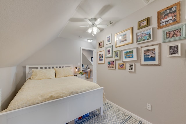 laundry area featuring cabinets, light tile patterned floors, and washing machine and dryer