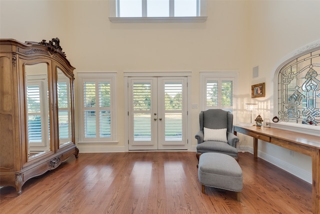 bedroom with vaulted ceiling with skylight, light tile patterned flooring, and ceiling fan