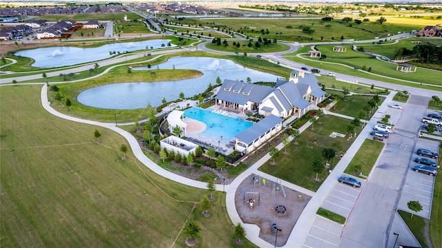 bird's eye view with a water view