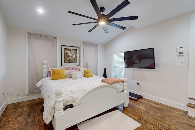 bedroom featuring dark wood-type flooring, ceiling fan, and lofted ceiling