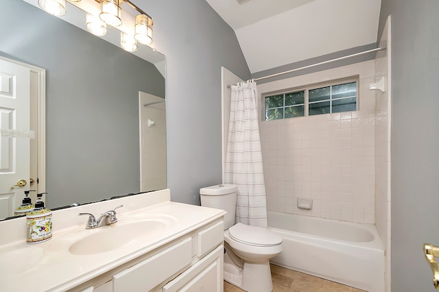 full bathroom with shower / bath combo, vanity, vaulted ceiling, tile patterned flooring, and toilet