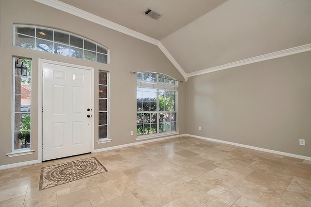 entryway featuring lofted ceiling and ornamental molding