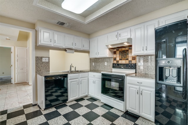 kitchen featuring black appliances, tasteful backsplash, sink, and white cabinets