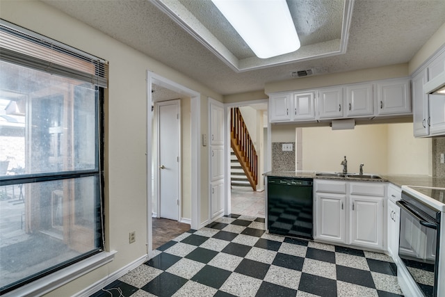 kitchen with white cabinets, sink, and black appliances