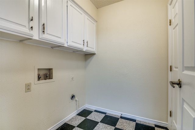 laundry area featuring cabinets, hookup for an electric dryer, and washer hookup