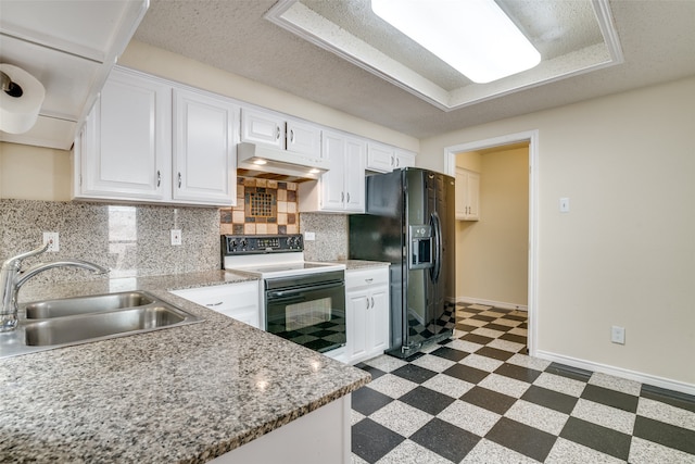 kitchen with black fridge, white cabinets, sink, a textured ceiling, and white electric stove