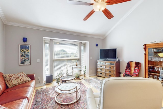 living room with ornamental molding, lofted ceiling, and ceiling fan