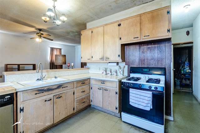 kitchen with hanging light fixtures, ceiling fan with notable chandelier, sink, white gas range oven, and light tile patterned floors