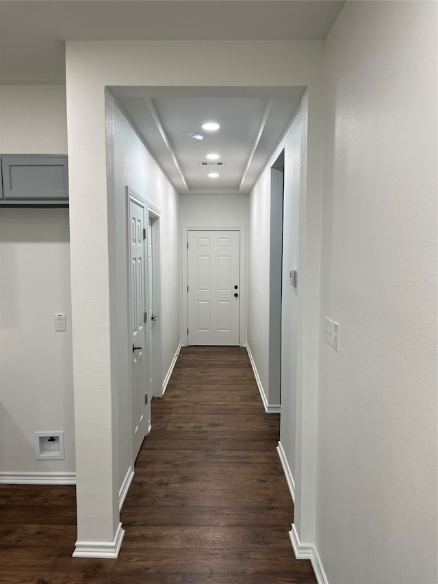 corridor featuring wood-type flooring