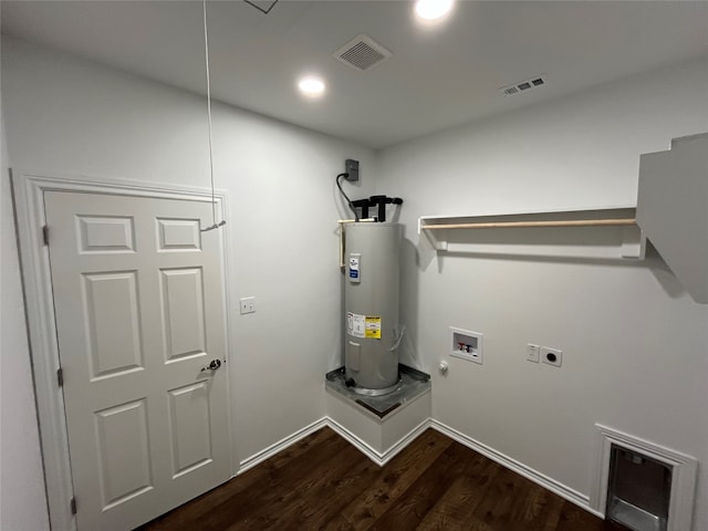 laundry room featuring water heater, dark hardwood / wood-style flooring, hookup for an electric dryer, and washer hookup