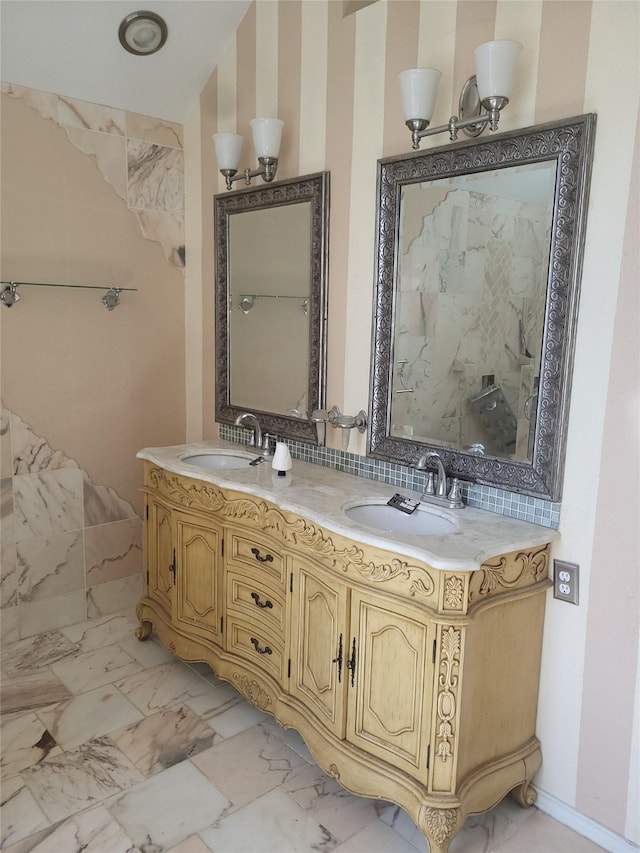 bathroom with vanity and backsplash