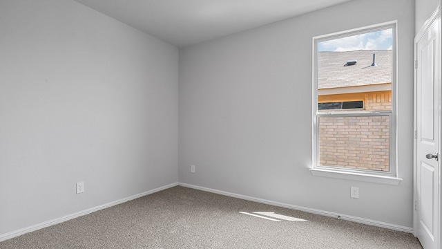 unfurnished room featuring carpet floors