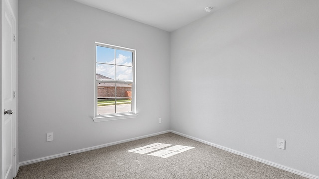 view of carpeted spare room