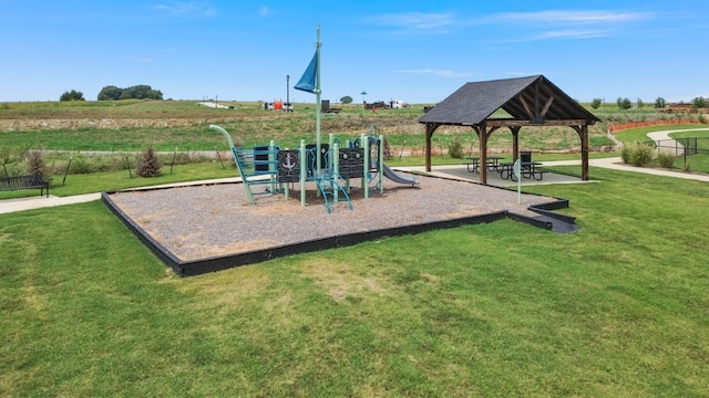 view of jungle gym featuring a yard and a gazebo