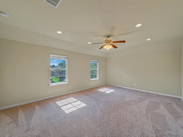 unfurnished room featuring carpet flooring and ceiling fan