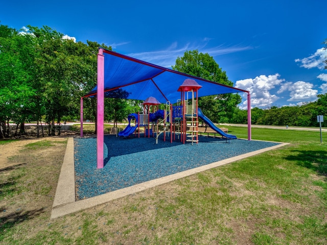 view of jungle gym featuring a yard