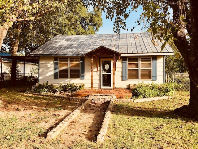 ranch-style house with a front lawn