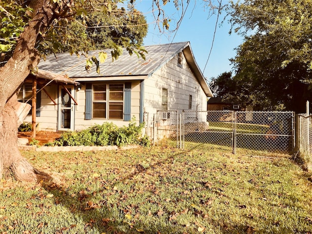 view of home's exterior featuring a lawn