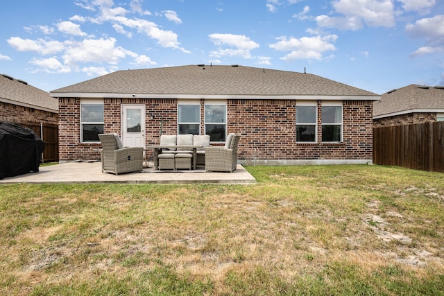 back of property featuring outdoor lounge area, a yard, and a patio