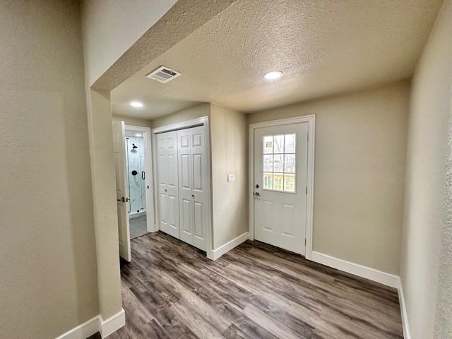 spare room with light hardwood / wood-style floors