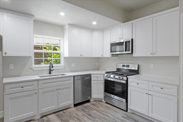 full bathroom with tiled shower / bath, vanity, toilet, and tile patterned floors