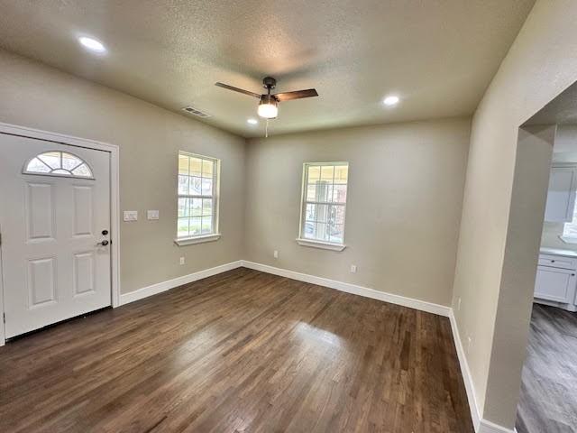 bedroom featuring hardwood / wood-style flooring, a closet, and ceiling fan