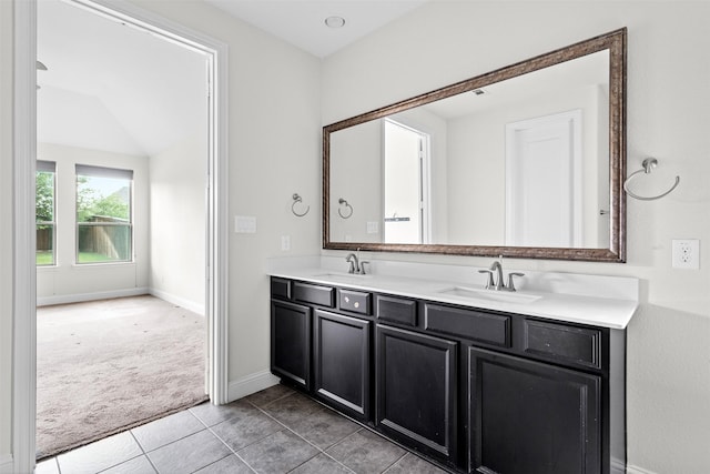 bathroom with tile patterned floors and vanity