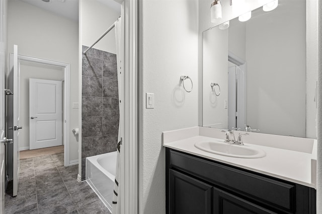 bathroom featuring shower / bathing tub combination and vanity