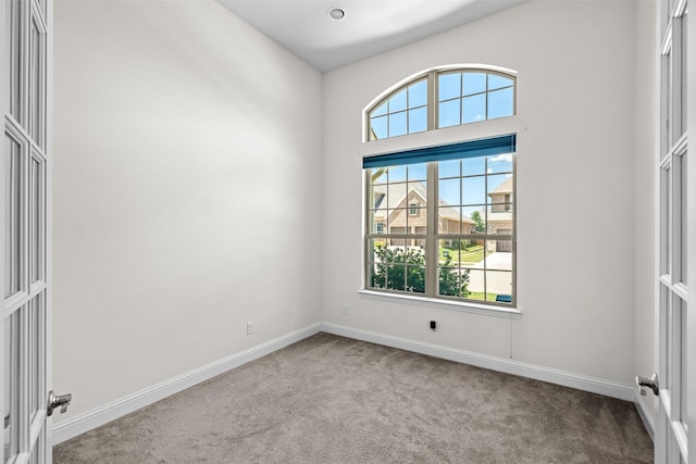 view of carpeted spare room