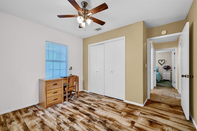 interior space featuring ceiling fan and light hardwood / wood-style flooring