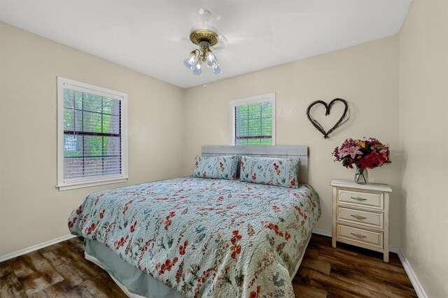 bedroom featuring dark wood-type flooring