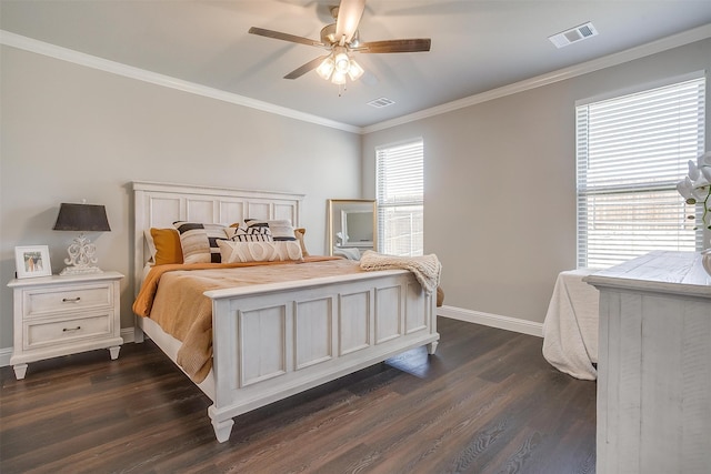 bedroom featuring ceiling fan, dark hardwood / wood-style floors, and crown molding