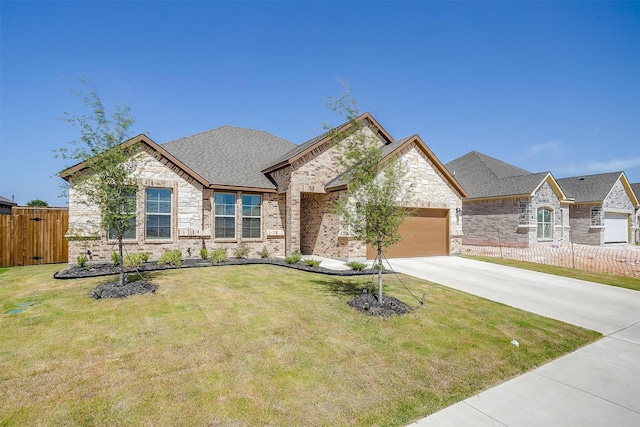 french country inspired facade featuring a front lawn