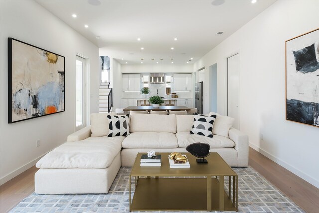 living room featuring light wood-type flooring