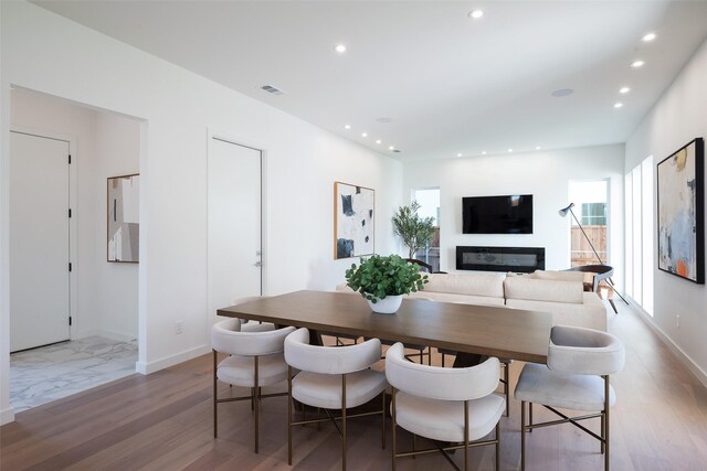 dining room featuring light hardwood / wood-style floors