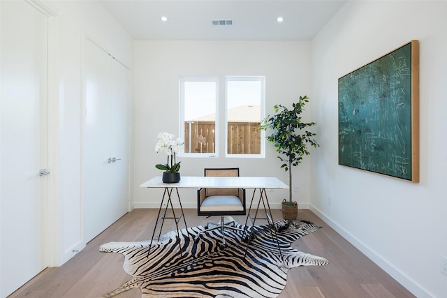 home office featuring light hardwood / wood-style flooring