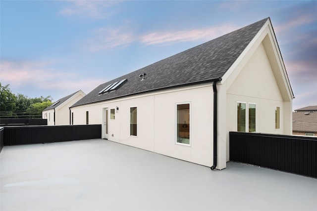 rear view of house featuring a patio area