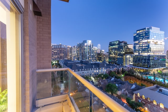 view of balcony at dusk