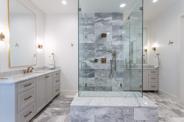 bathroom with vanity and walk in shower