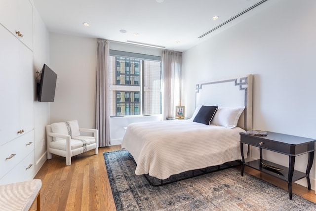 bedroom featuring light wood-type flooring