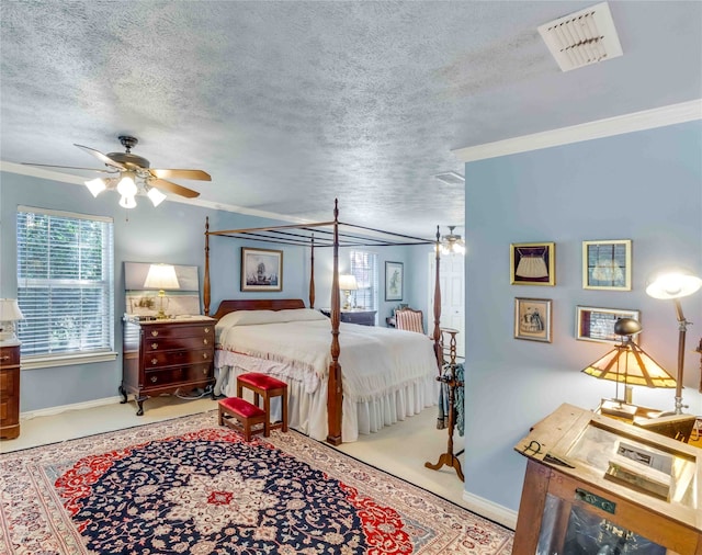 bedroom with baseboards, visible vents, a textured ceiling, and ornamental molding