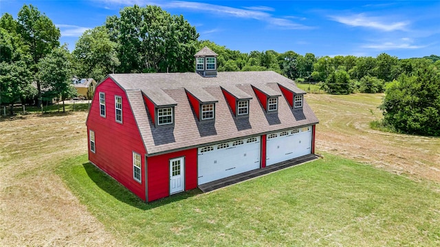 exterior space with a detached garage