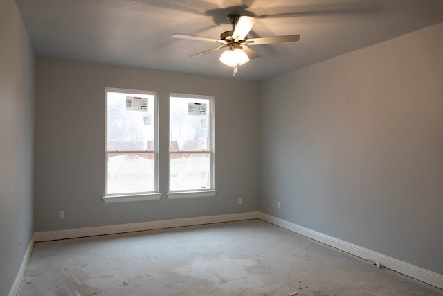 unfurnished room with a textured ceiling and ceiling fan