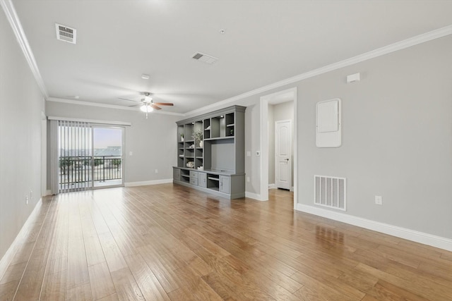 unfurnished living room with visible vents and light wood-style floors