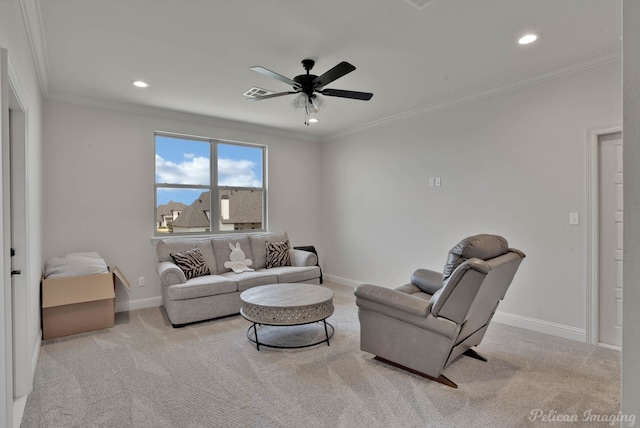 living room featuring light carpet, ornamental molding, and ceiling fan