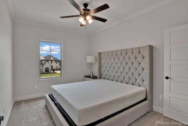 bedroom featuring ceiling fan, light carpet, and ornamental molding