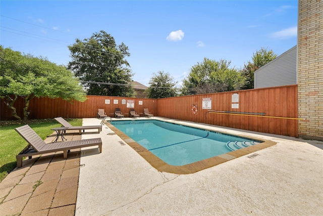 view of pool with a patio area