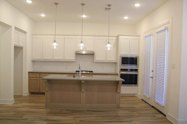 dining space with dark hardwood / wood-style flooring