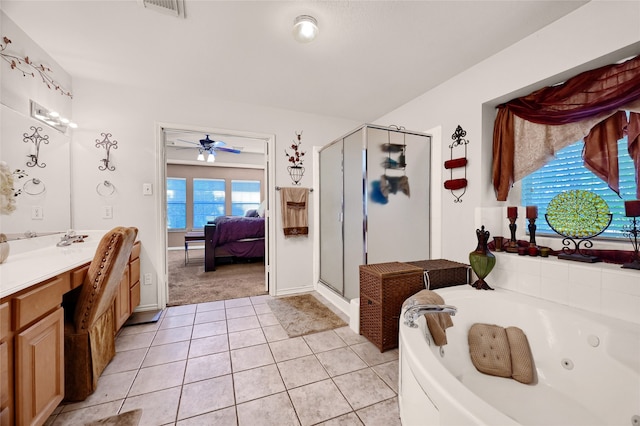 bathroom featuring visible vents, a shower stall, vanity, tile patterned flooring, and a tub with jets