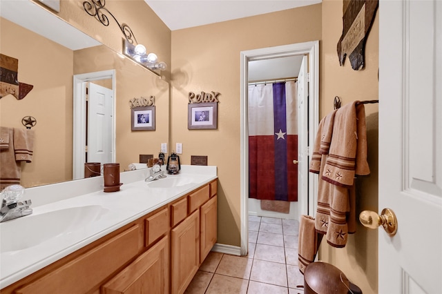 bathroom with vanity and tile patterned floors